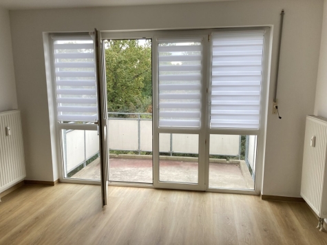 Ab 01.08.26! 1-Raum WE mit Balkon, Einbauküche und Tiefgaragenstellplatz in ruhiger Seitenstraße - Wohnzimmer (5594)